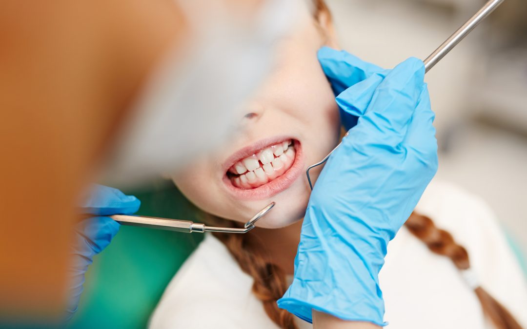 little girl grinding her teeth during examination - Children's Dental Center, Sioux Falls, SD