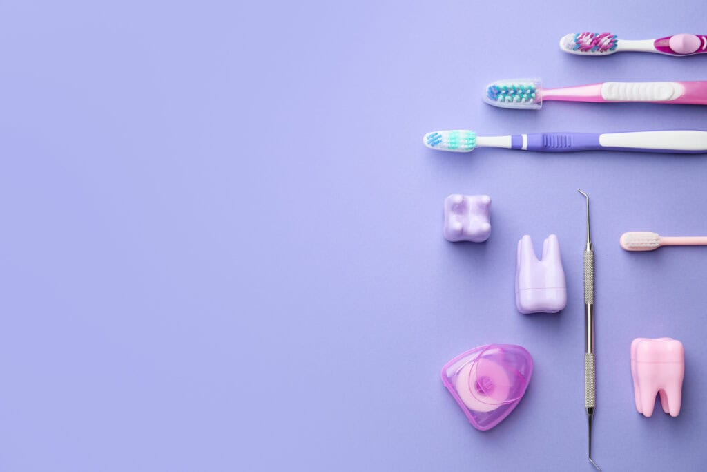 Set for oral hygiene on color background